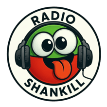 The Radio Shankill mascot, a green headphone-wearing character with a cream badge ring